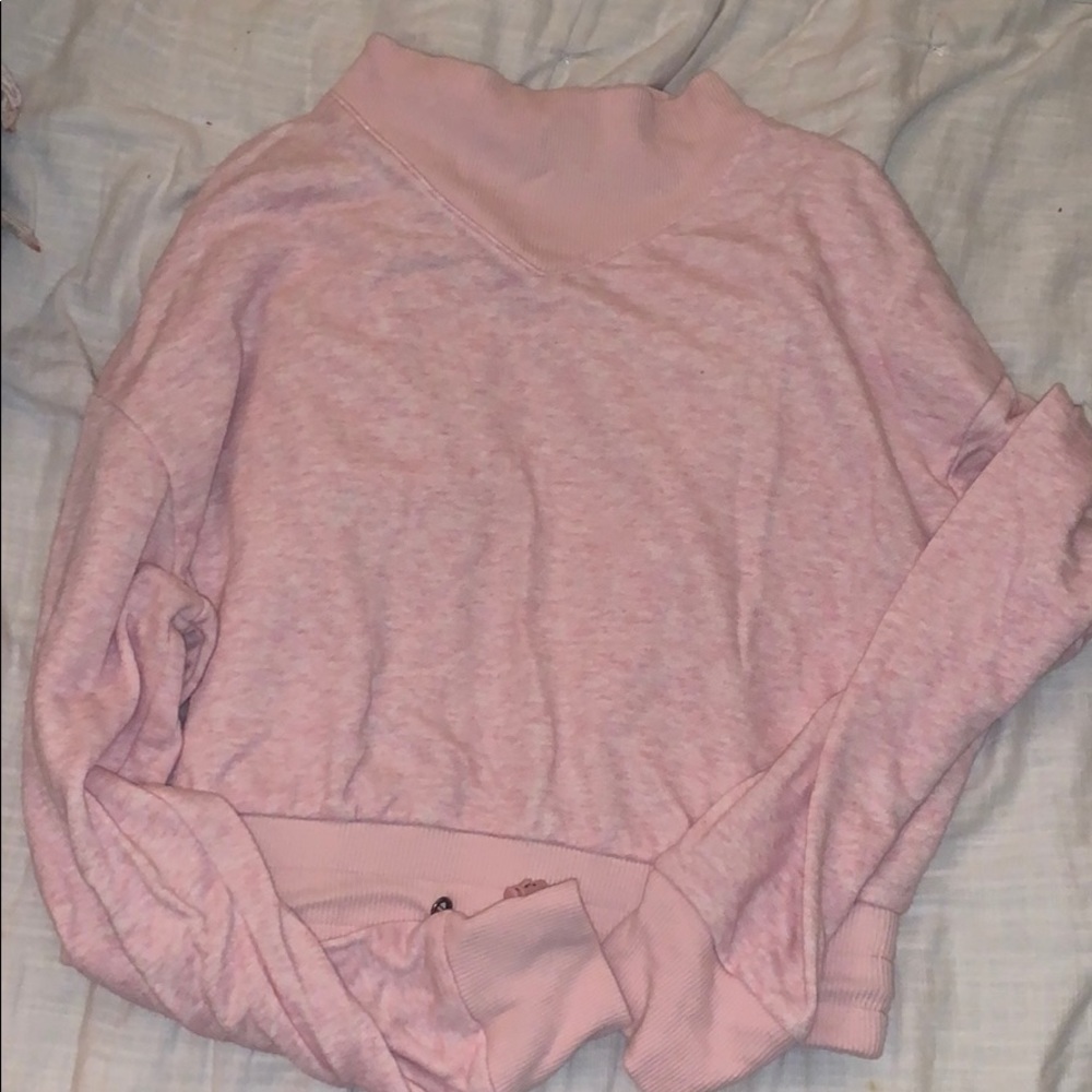 Sweater with ability to be cropped if adjusted